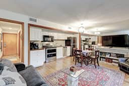 Comfortable ground-floor condo with enclosed patio, washer/dryer, & AC