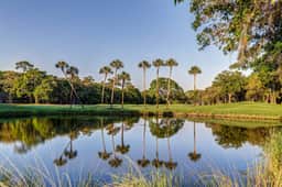 Lovely condo near beach with enclosed porch, pool, tennis, and golf access