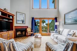 Three-story ocean-view villa with pool, balcony, charcoal grill, & central AC