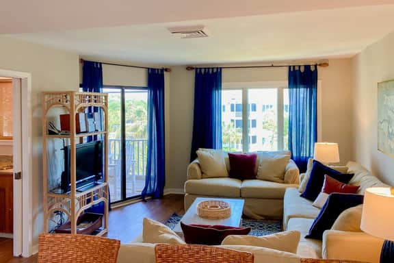 Lovely top floor villa in Wild Dunes with partial ocean views, pool, & W/D
