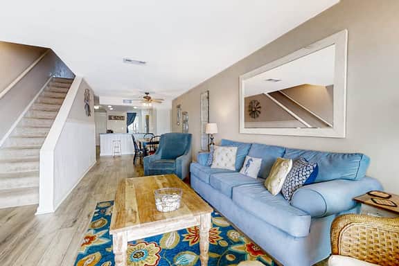 Newly renovated two-story waterfront condo with screened porch, pool, & tennis