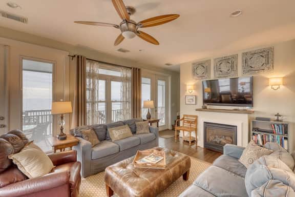 Raised oceanfront home with elevator & outdoor shower just steps from beach
