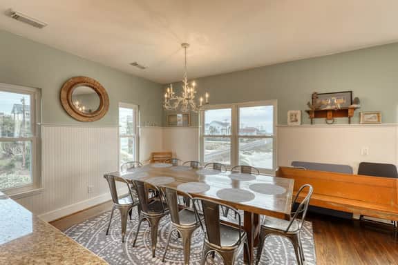 Raised oceanfront home with elevator & outdoor shower just steps from beach