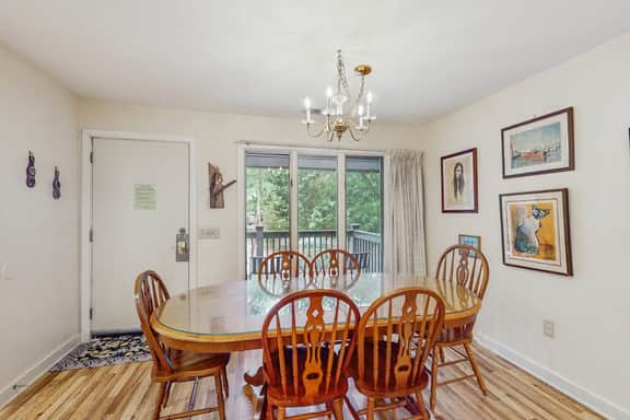 Scenic-view cottage with sunroom, deck, kitchen & pool - close to beach & golf
