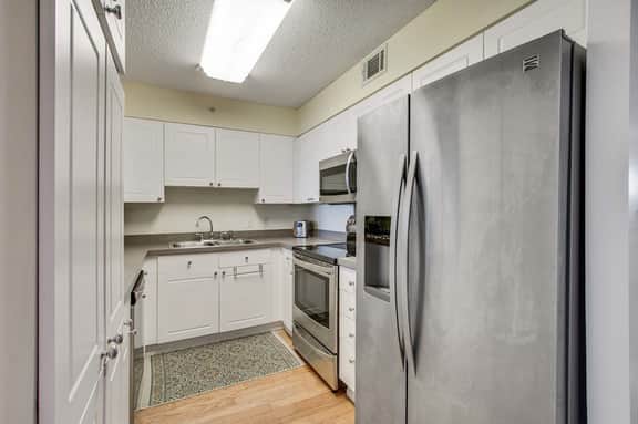 Second-floor condo with river views and access to a community pool