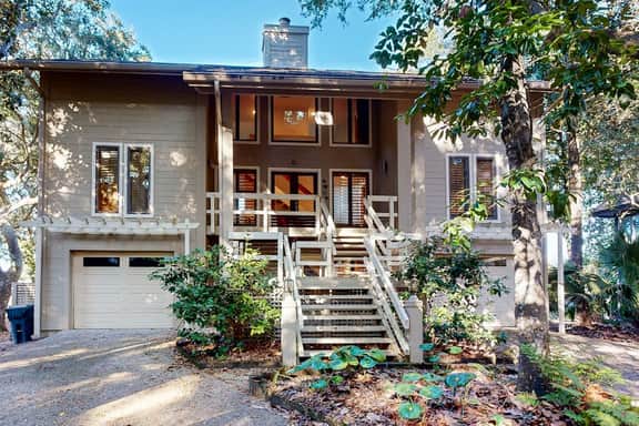 Stunning Home with river marsh views, golf course views and close beach access