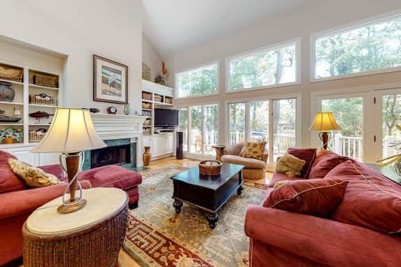 Updated island estate with serene lagoon views & 2 decks - bike to beach