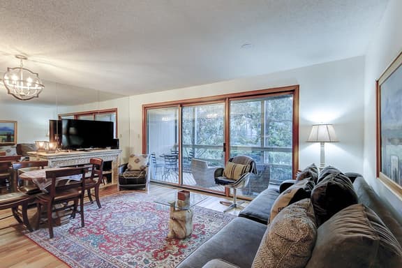 Comfortable ground-floor condo with enclosed patio, washer/dryer, & AC